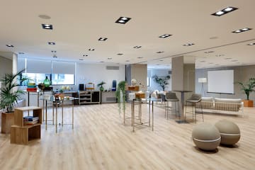 a room with tables and chairs