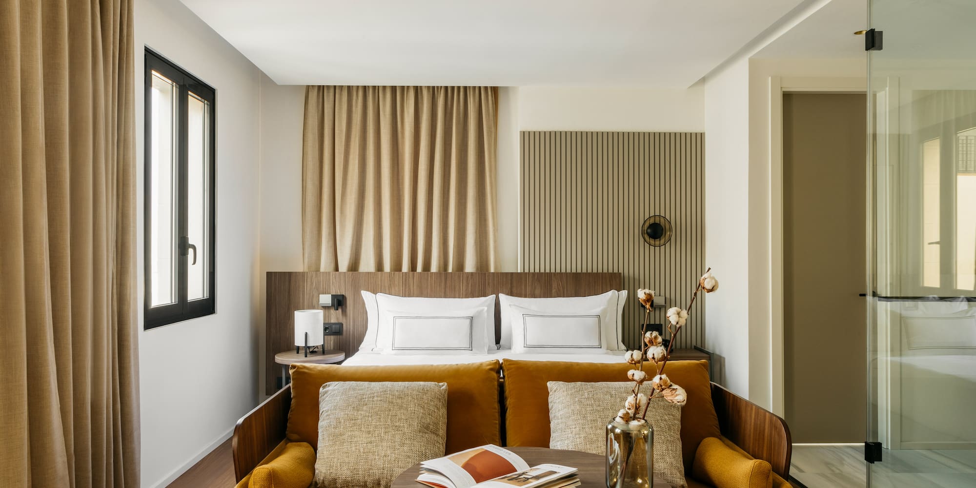 a room with a couch and a bed