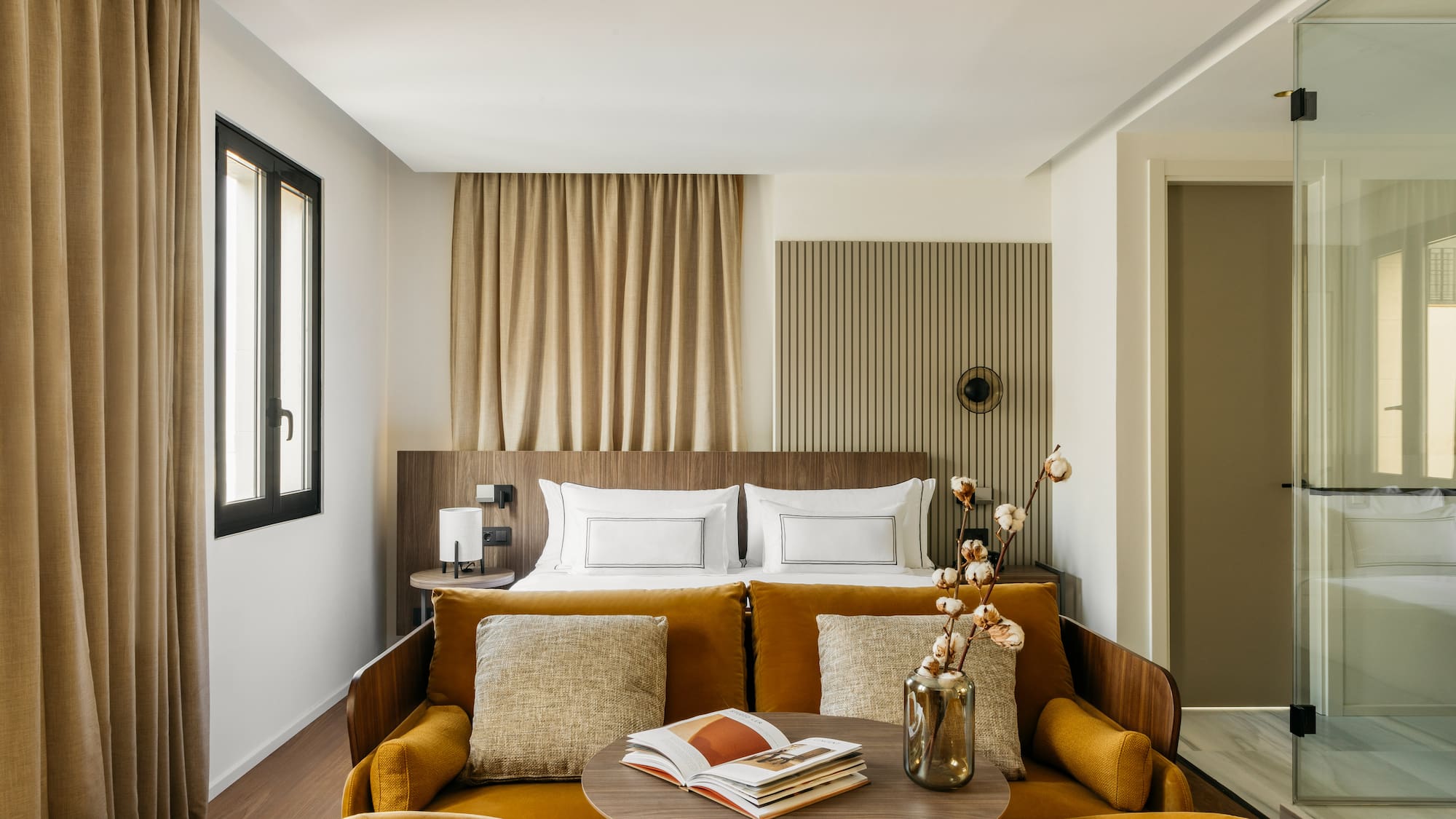 a room with a couch and a bed