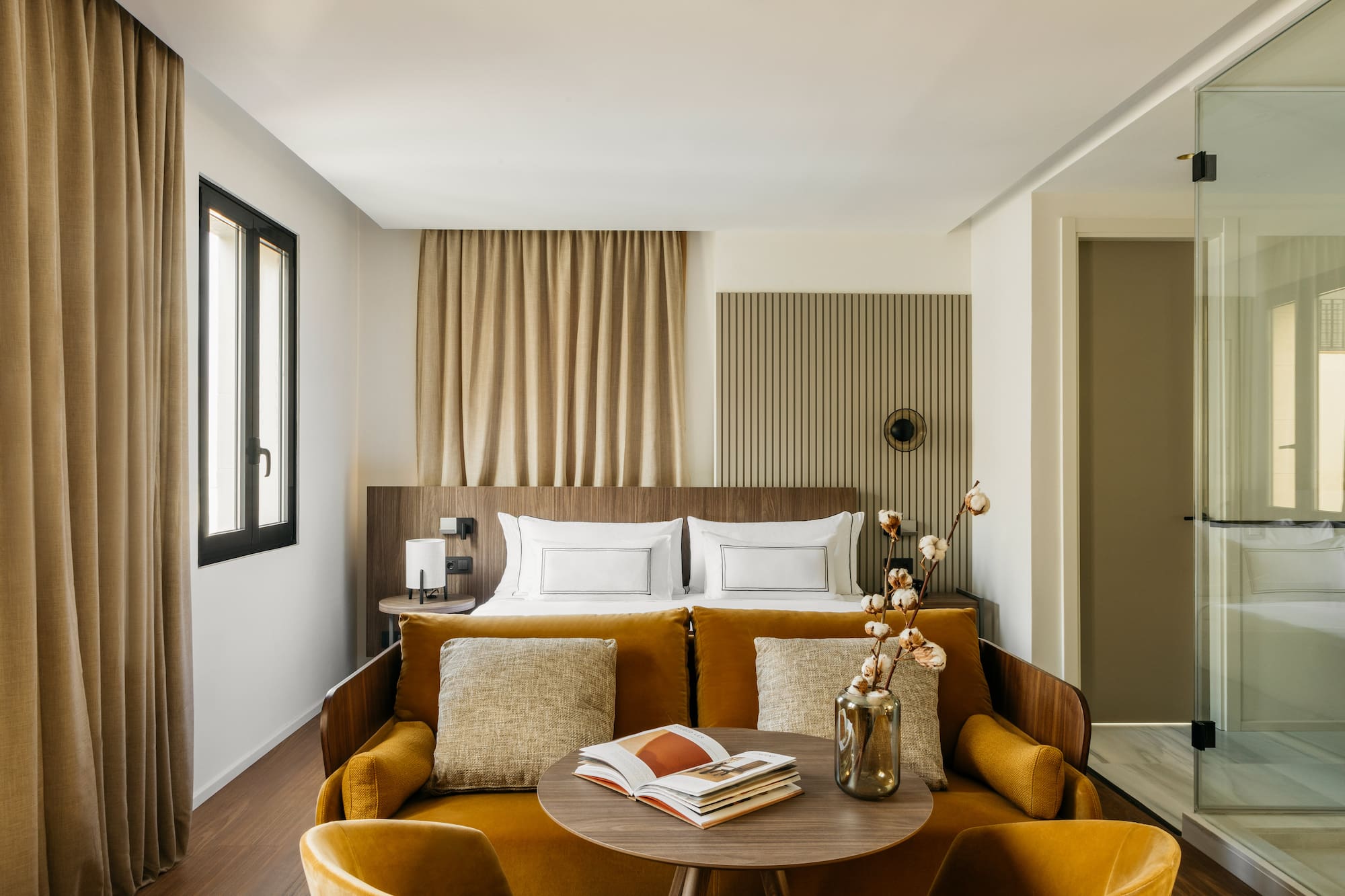 a room with a couch and a bed