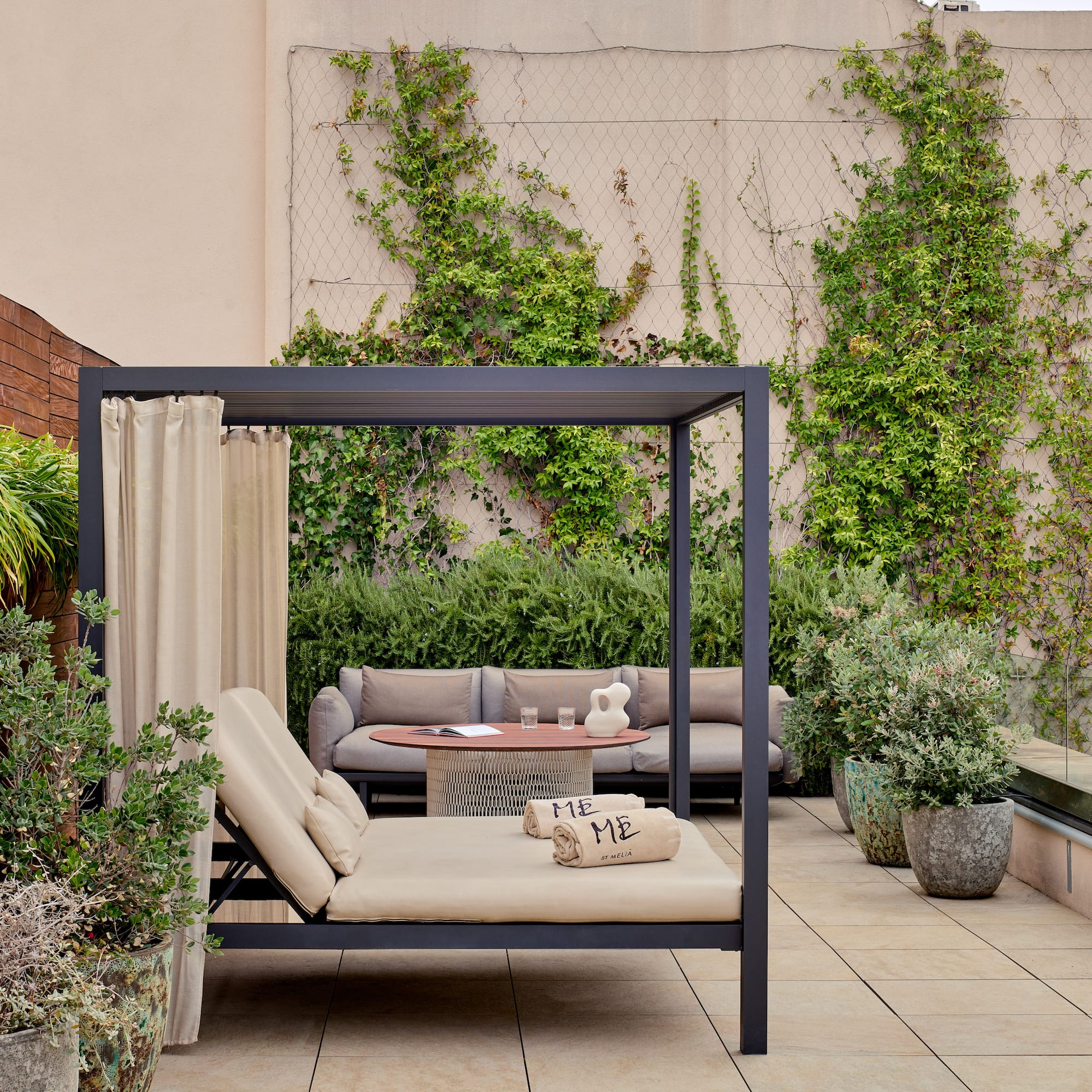 a patio with a couch and a table