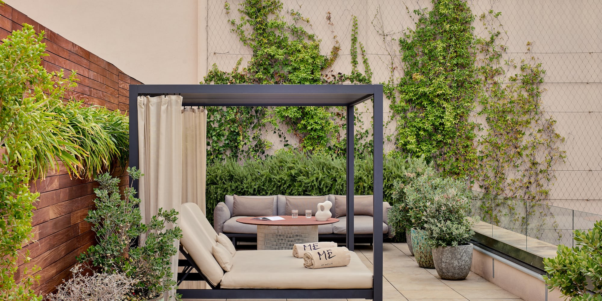 a patio with a couch and a table