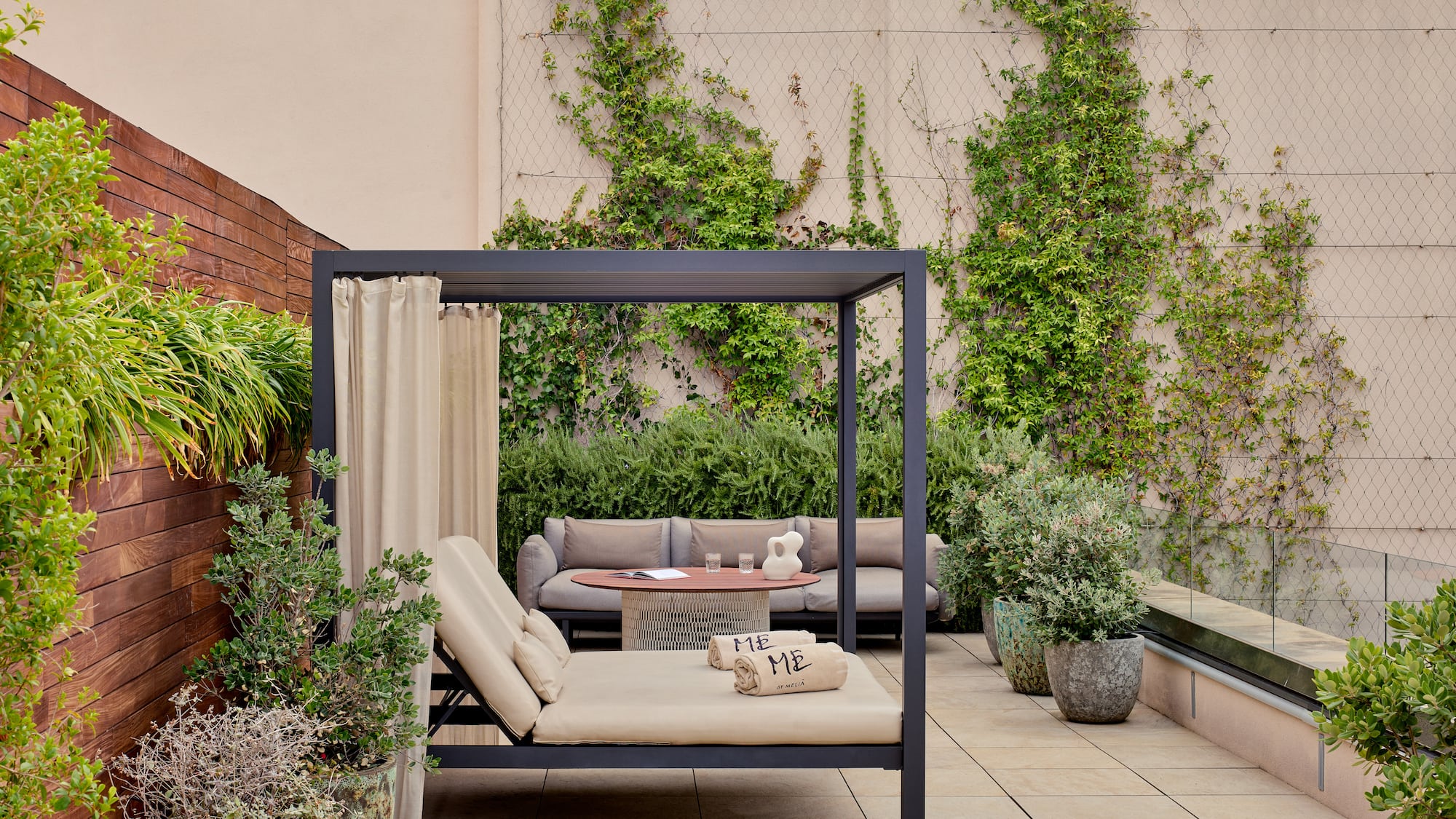 a patio with a couch and a table