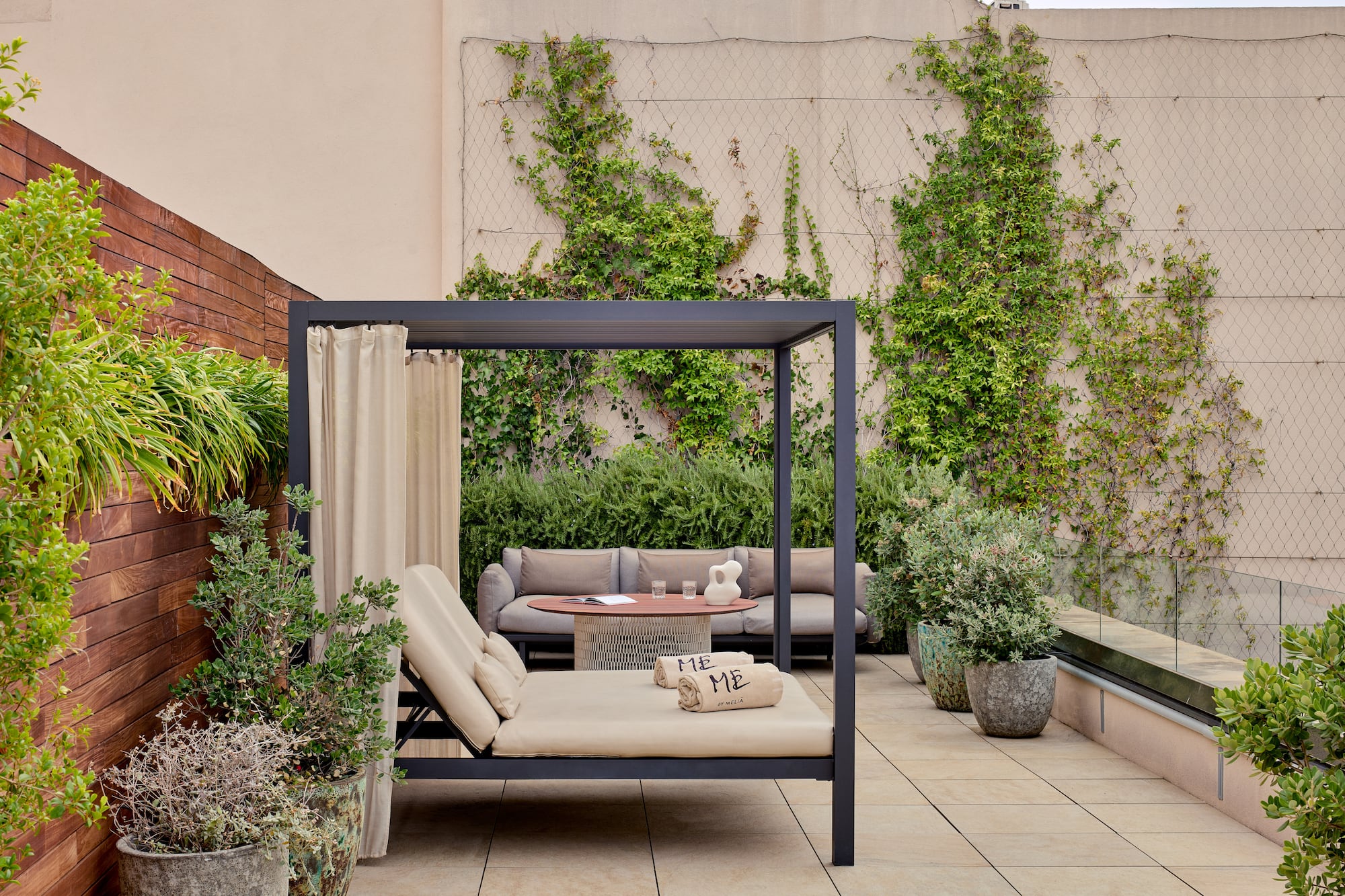 a patio with a couch and a table