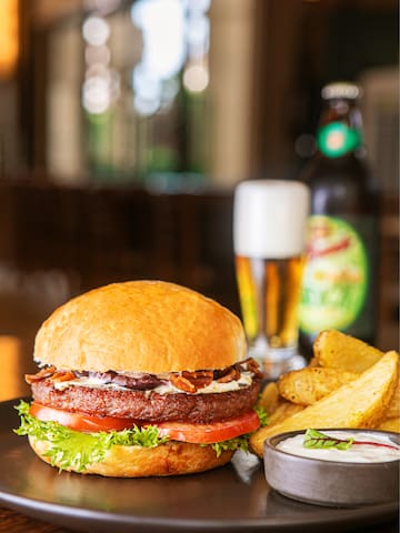 a burger and fries on a plate