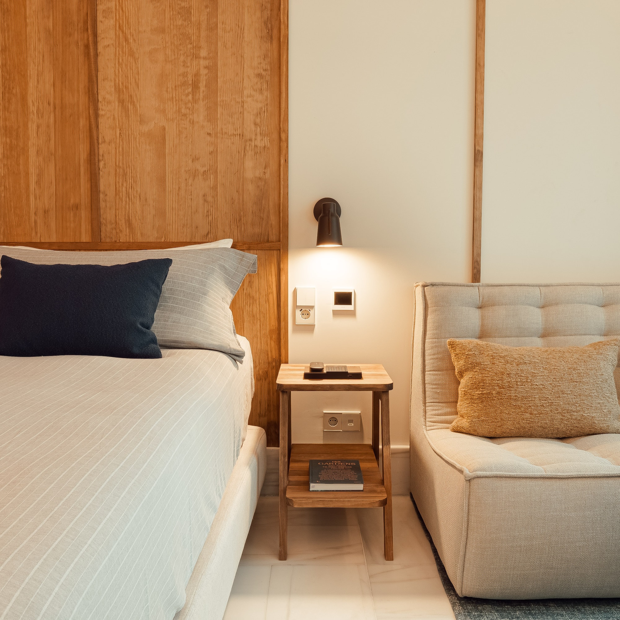 a bed and a chair in a room