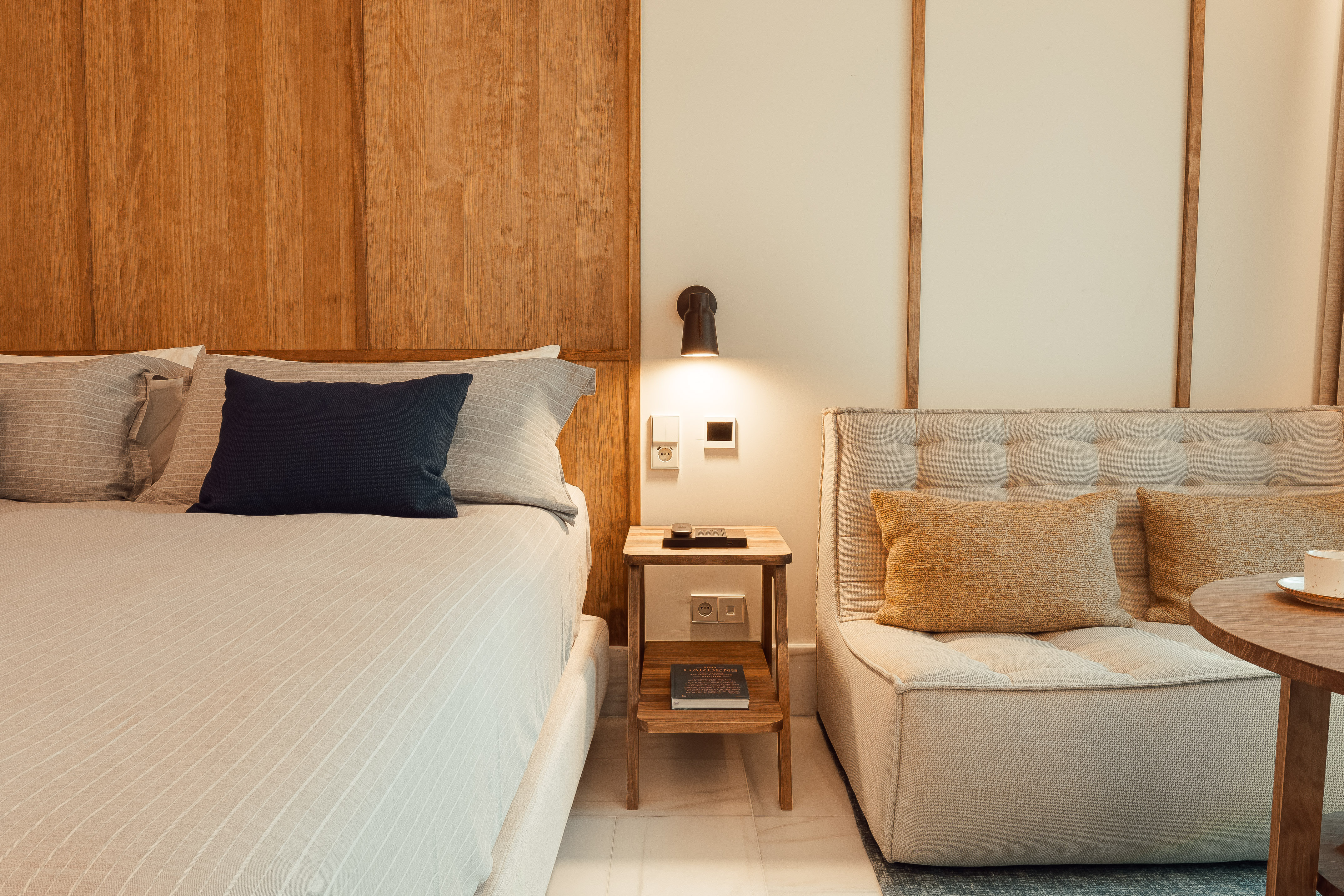 a bed and a chair in a room