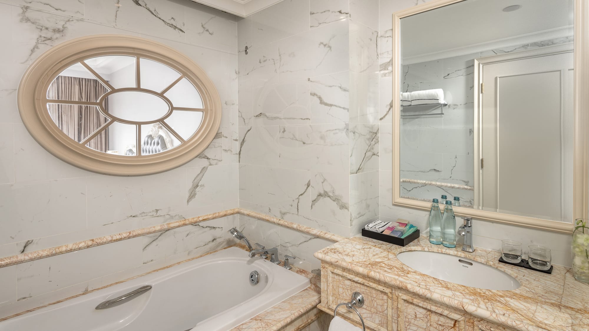 a bathroom with a tub and sink