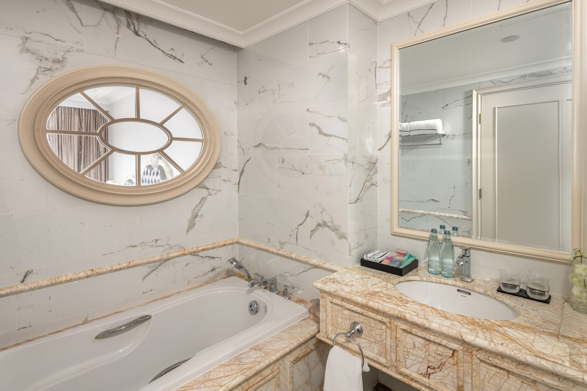 a bathroom with a tub and sink