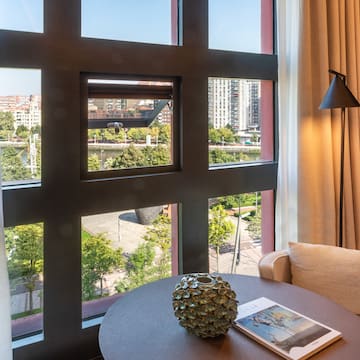 a room with a table and a lamp