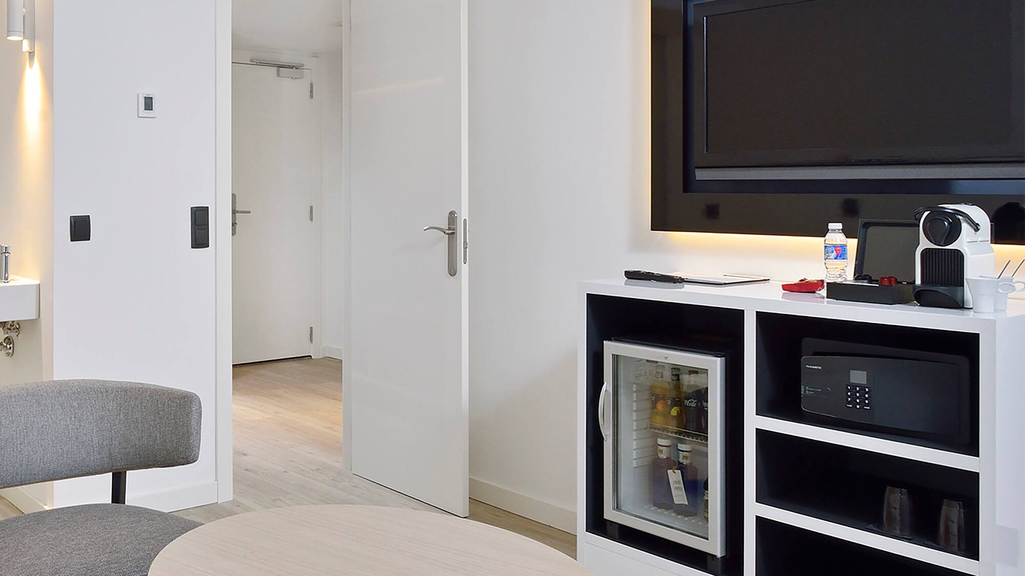 a room with a television and a table