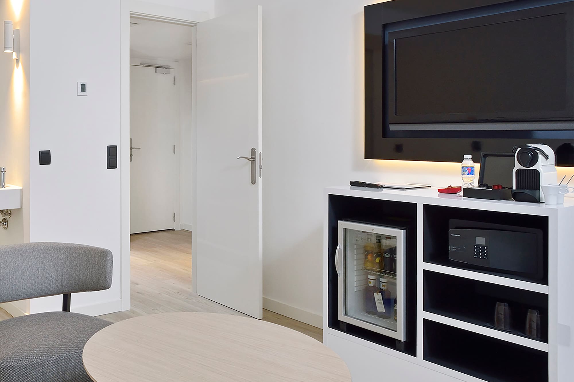 a room with a television and a table