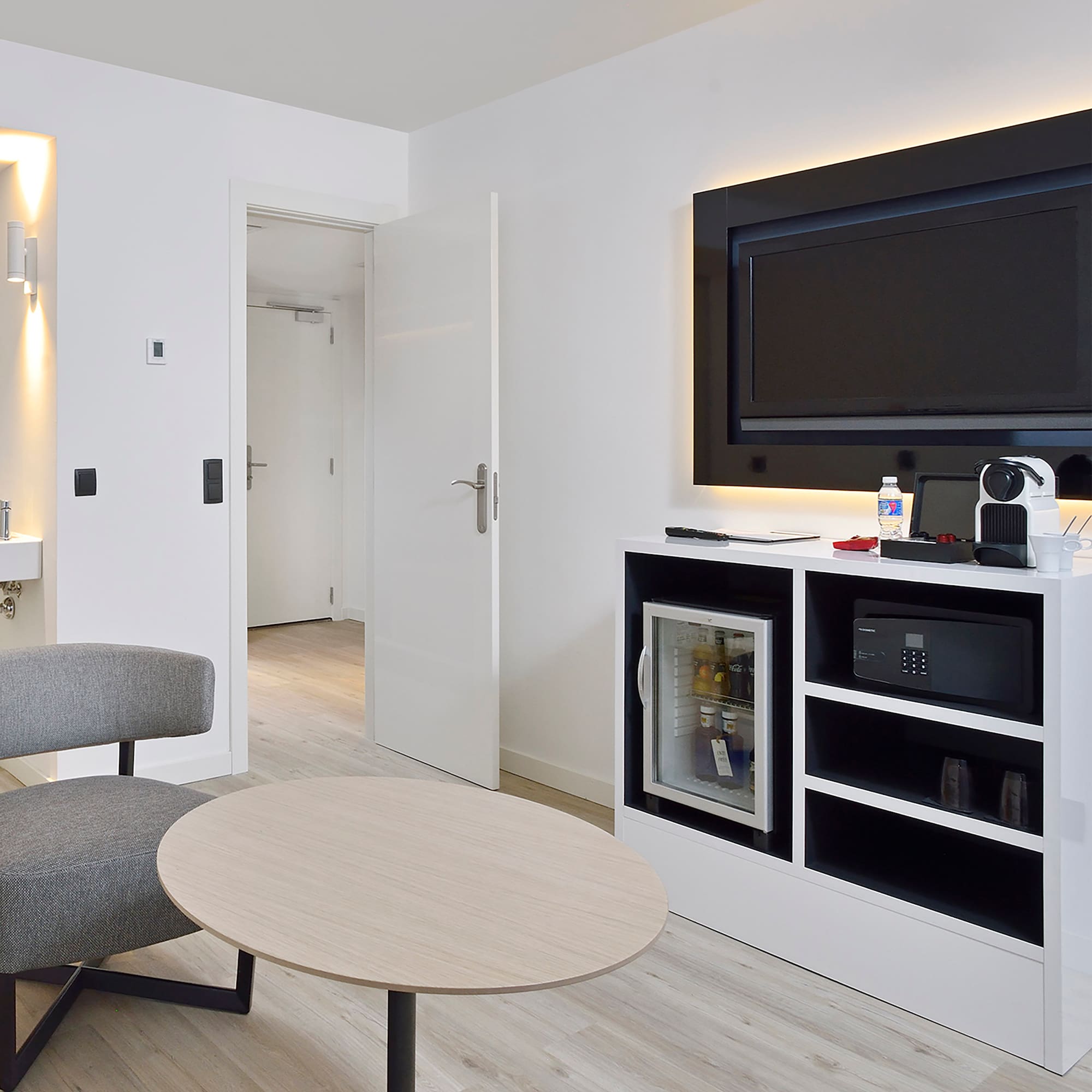 a room with a television and a table