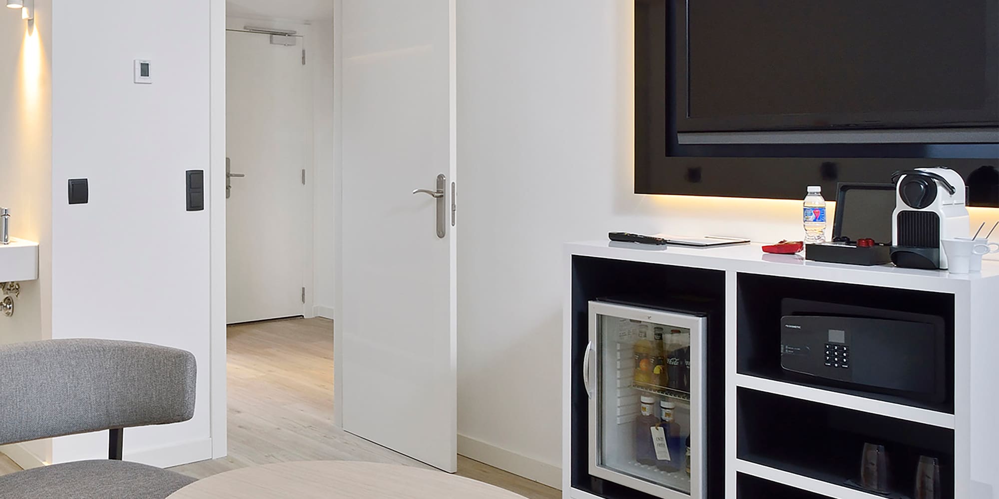 a room with a television and a table