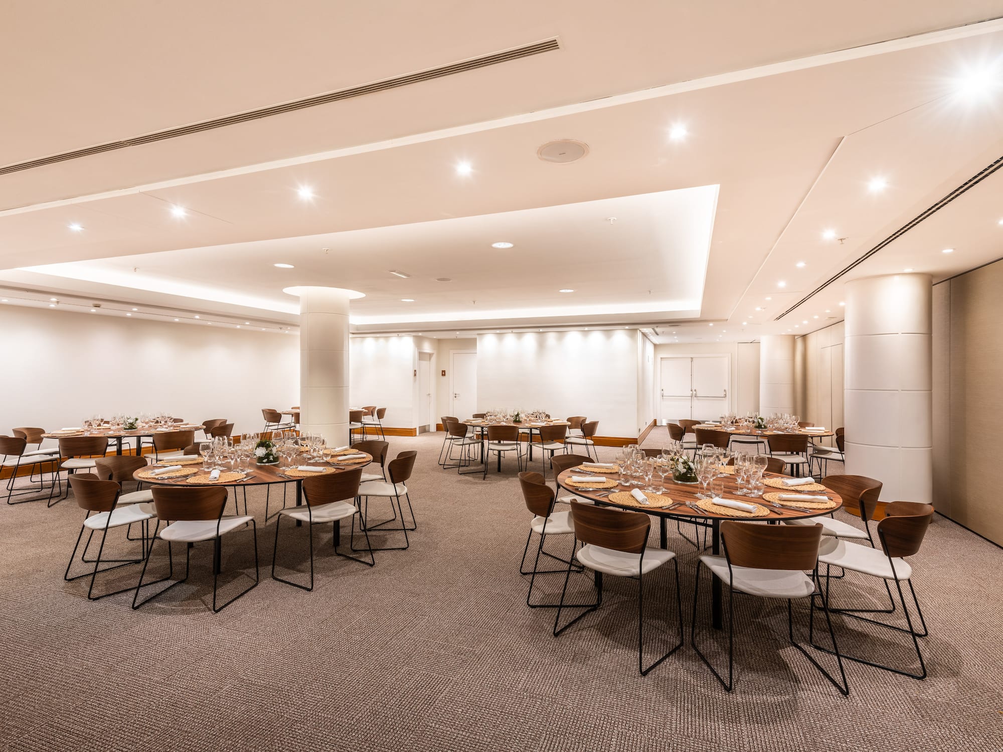 a room with tables and chairs