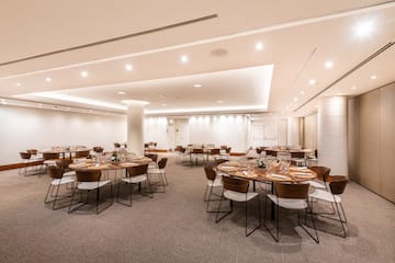 a room with tables and chairs