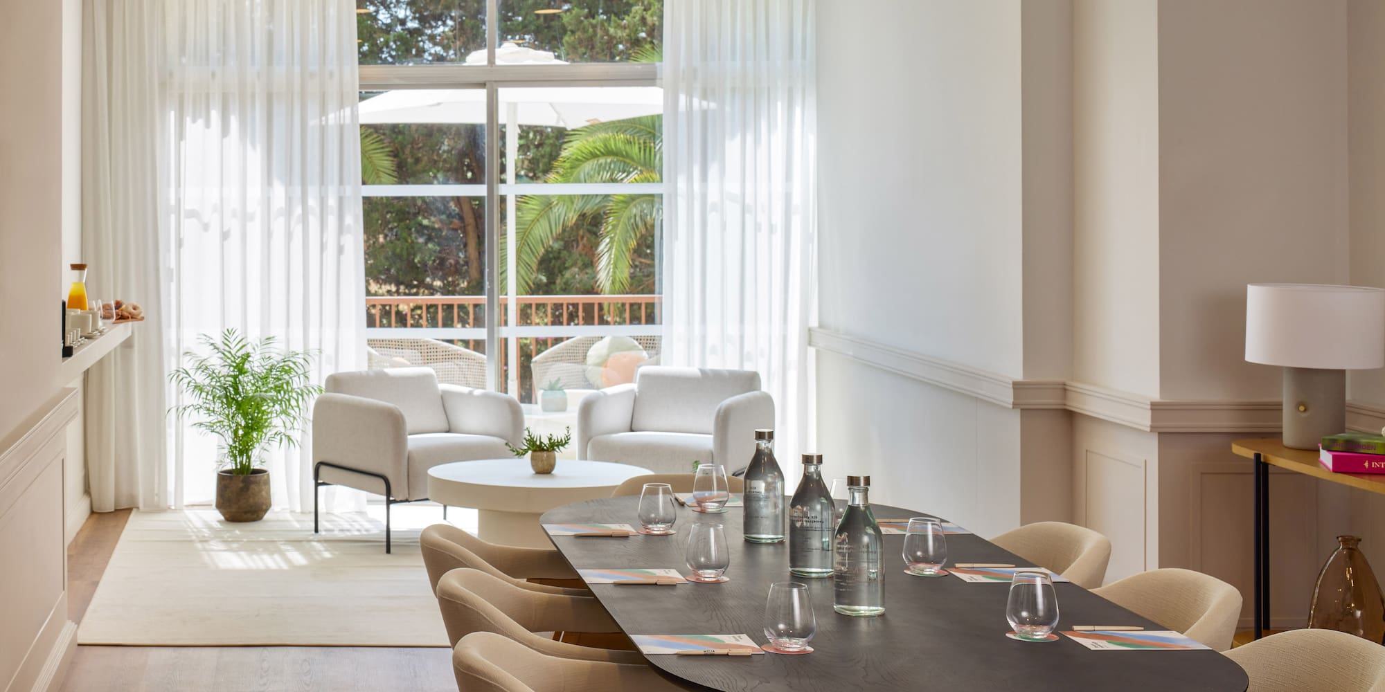 a room with a table and chairs