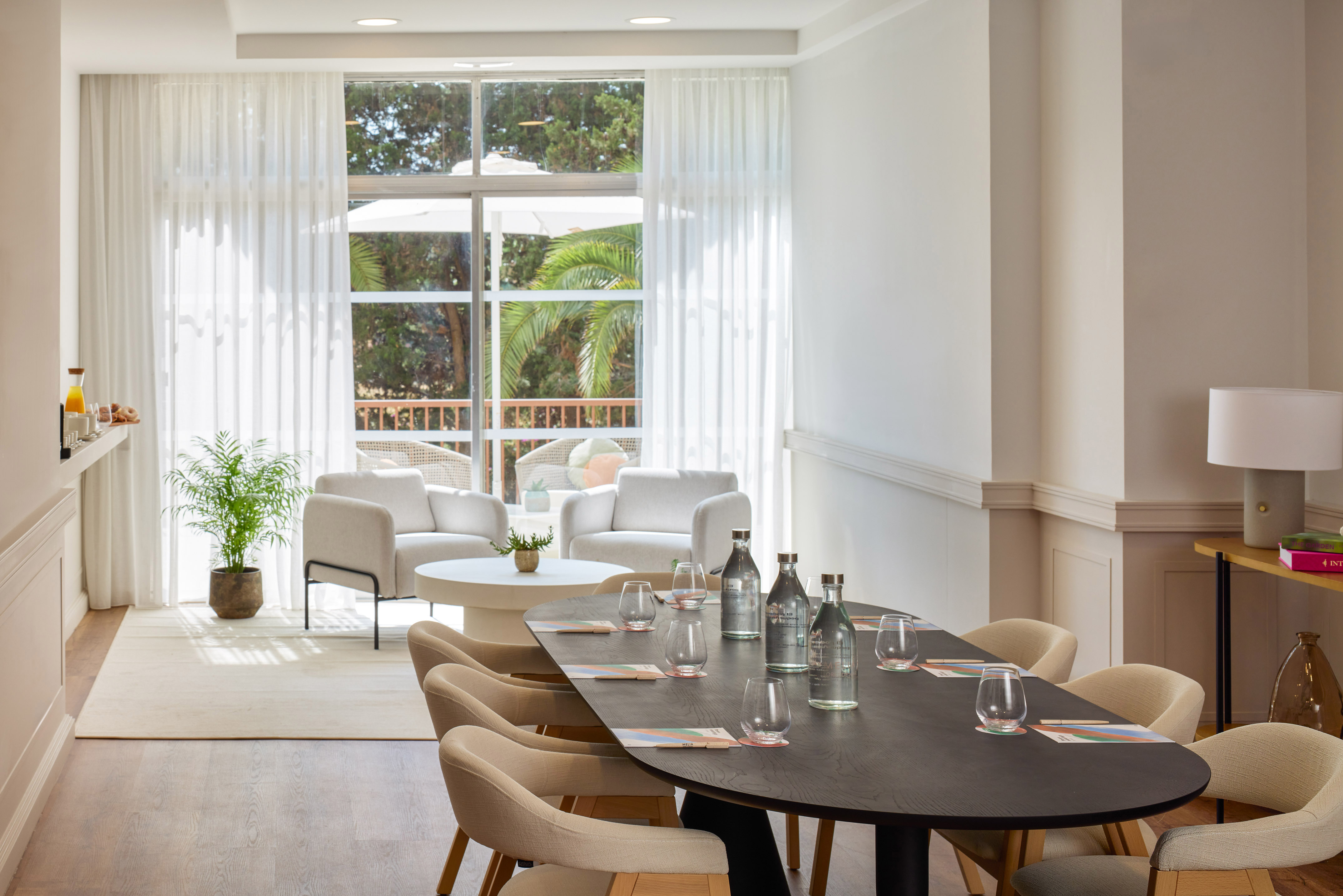 a room with a table and chairs