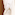 Plush white bathrobe and slippers with LEVEL logo luxury hotel amenities.