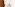 Plush white bathrobe and slippers with LEVEL logo luxury hotel amenities.