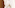 Plush white bathrobe and slippers with LEVEL logo luxury hotel amenities.