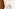 Plush white bathrobe and slippers with LEVEL logo luxury hotel amenities.