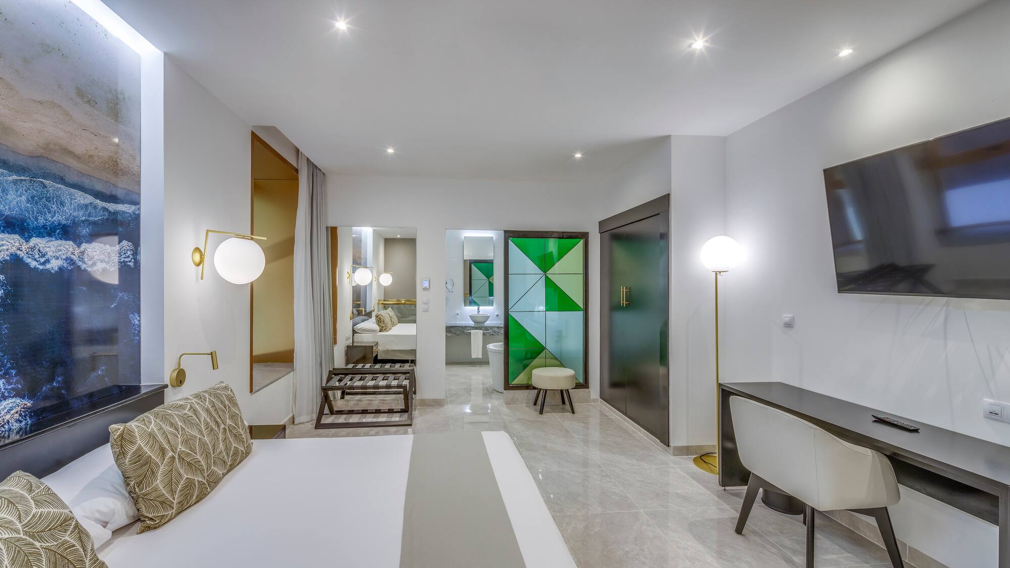 a room with a bed and a mirror