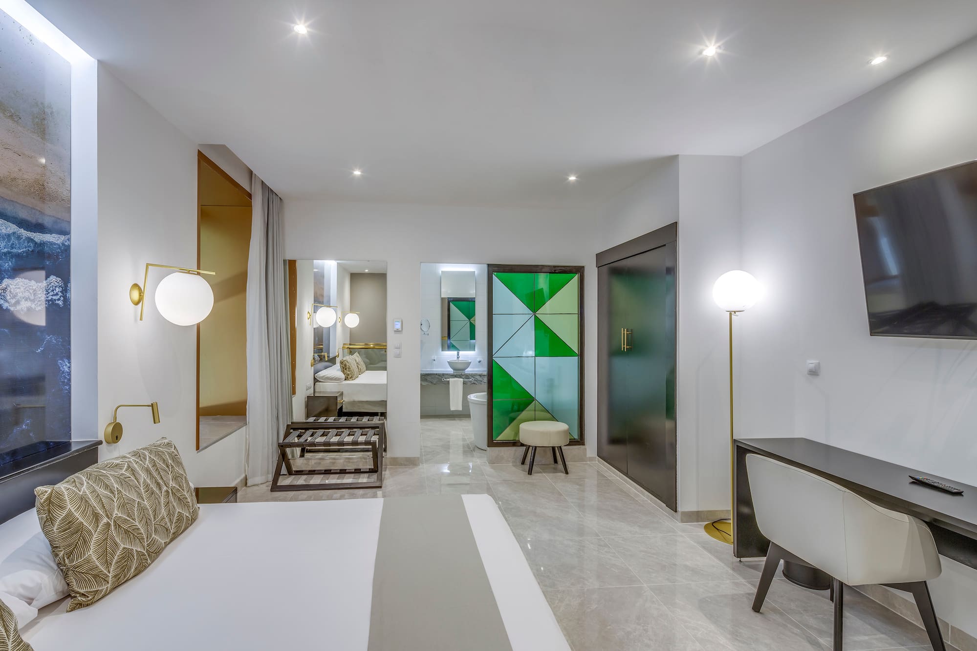 a room with a bed and a mirror