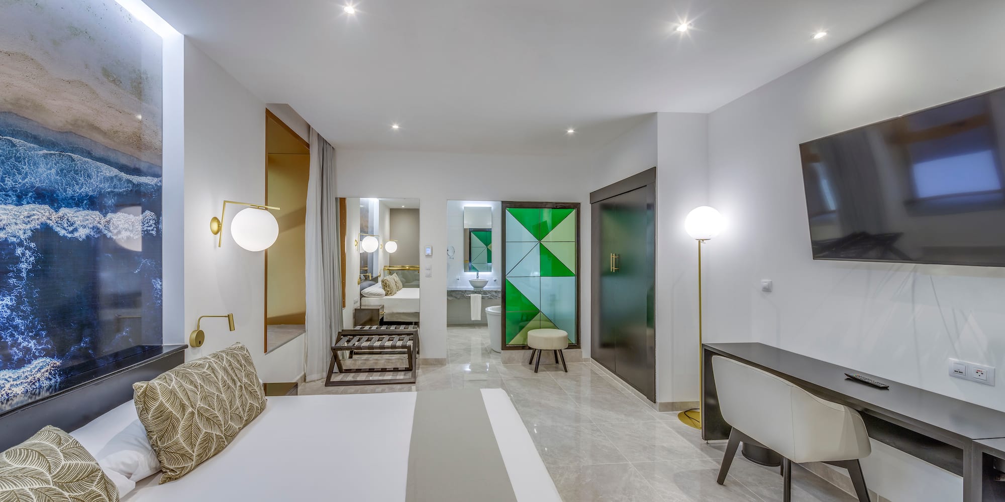 a room with a bed and a mirror