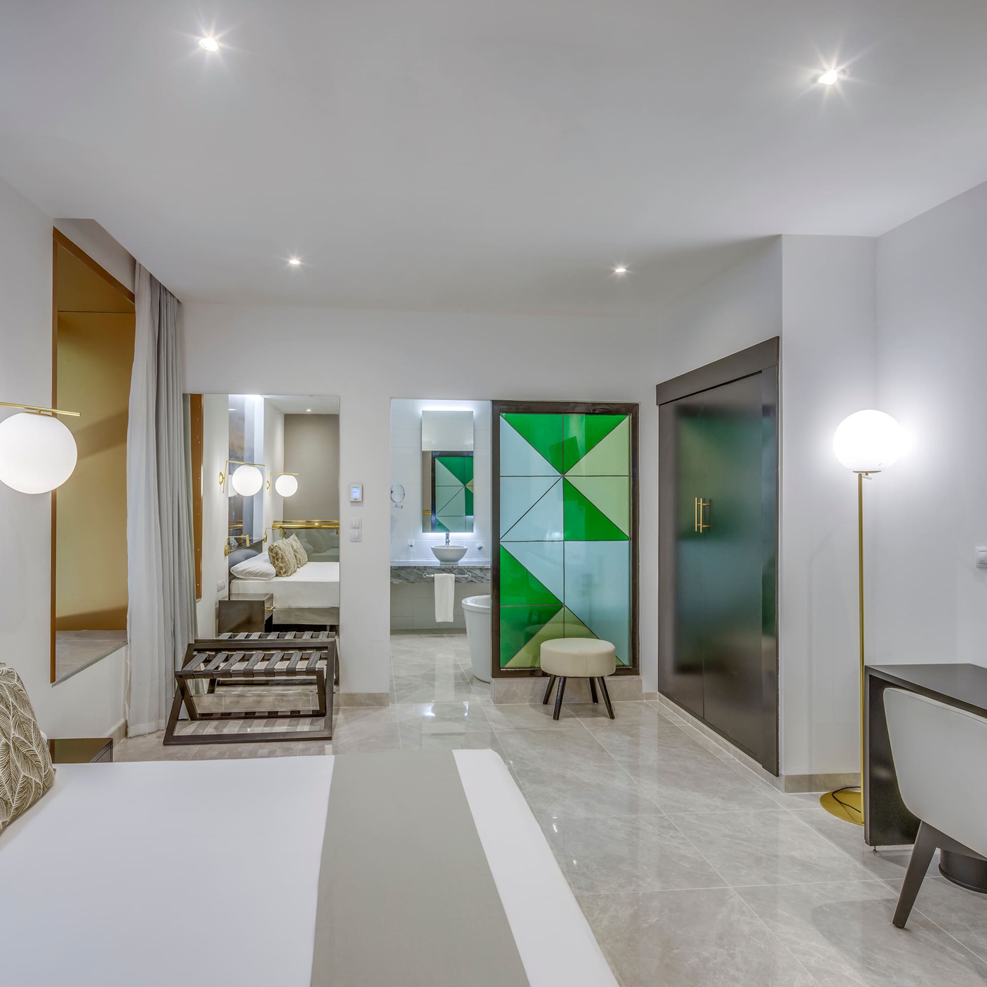 a room with a bed and a mirror