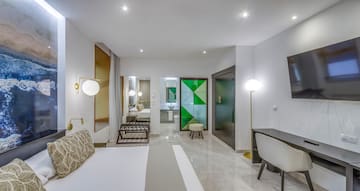 a room with a bed and a mirror