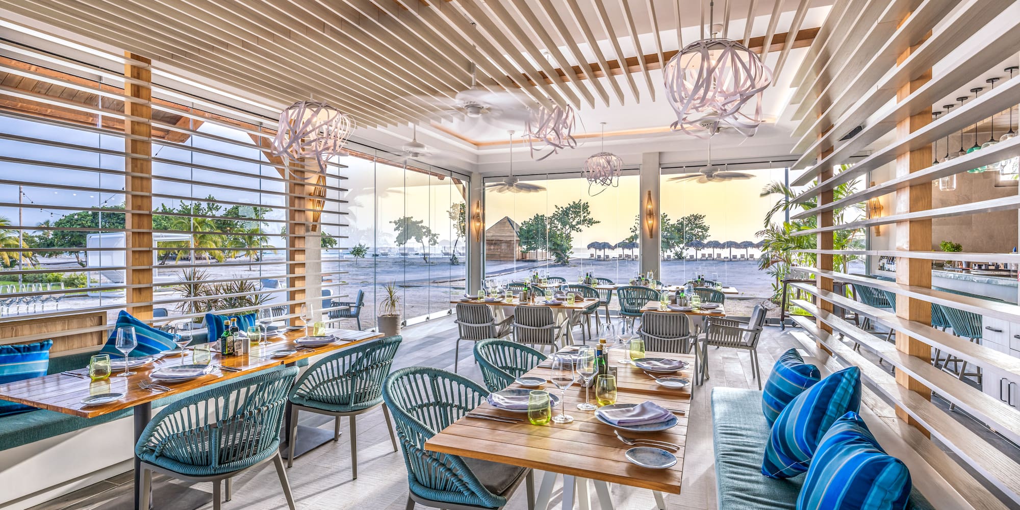 a restaurant with tables and chairs