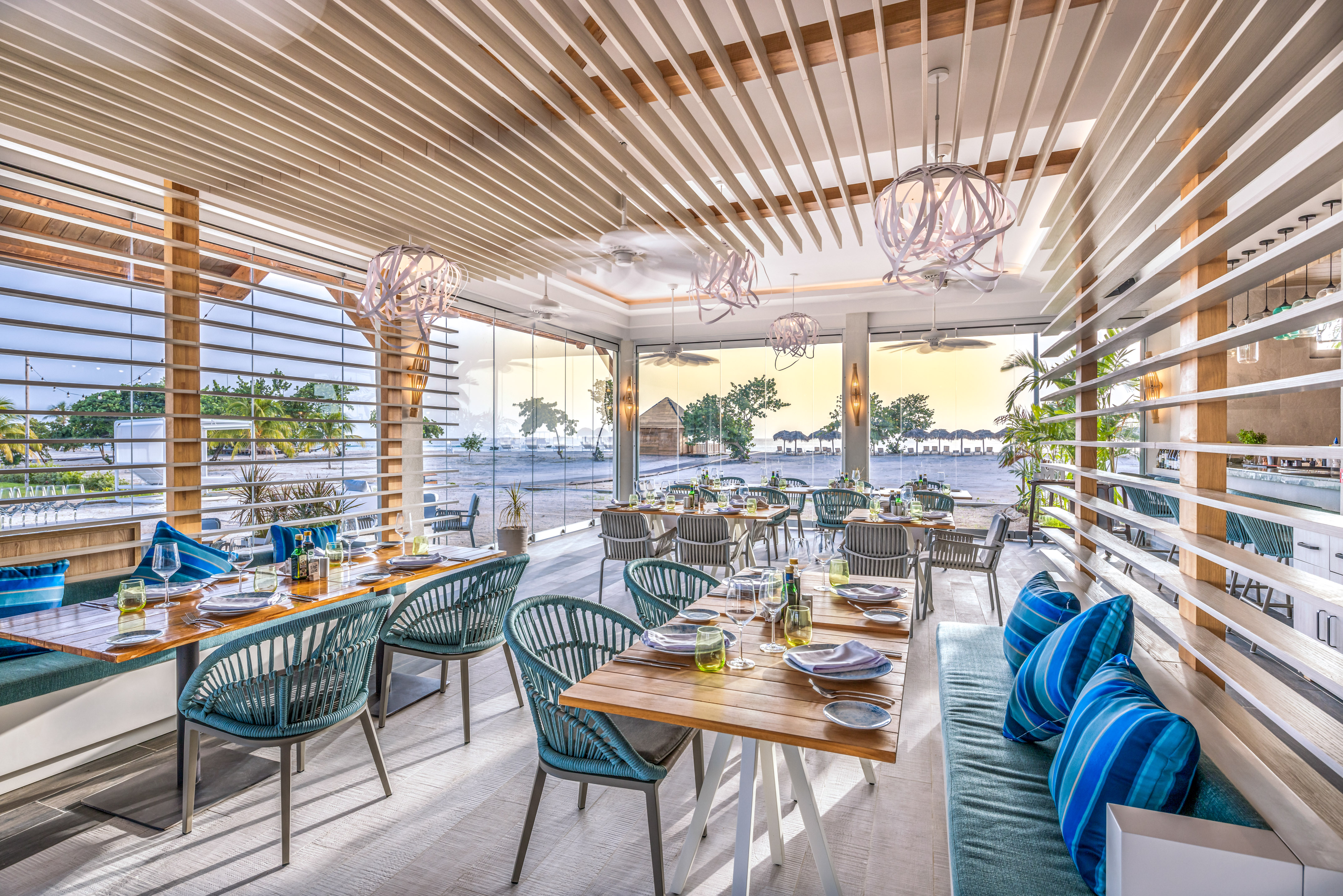 a restaurant with tables and chairs