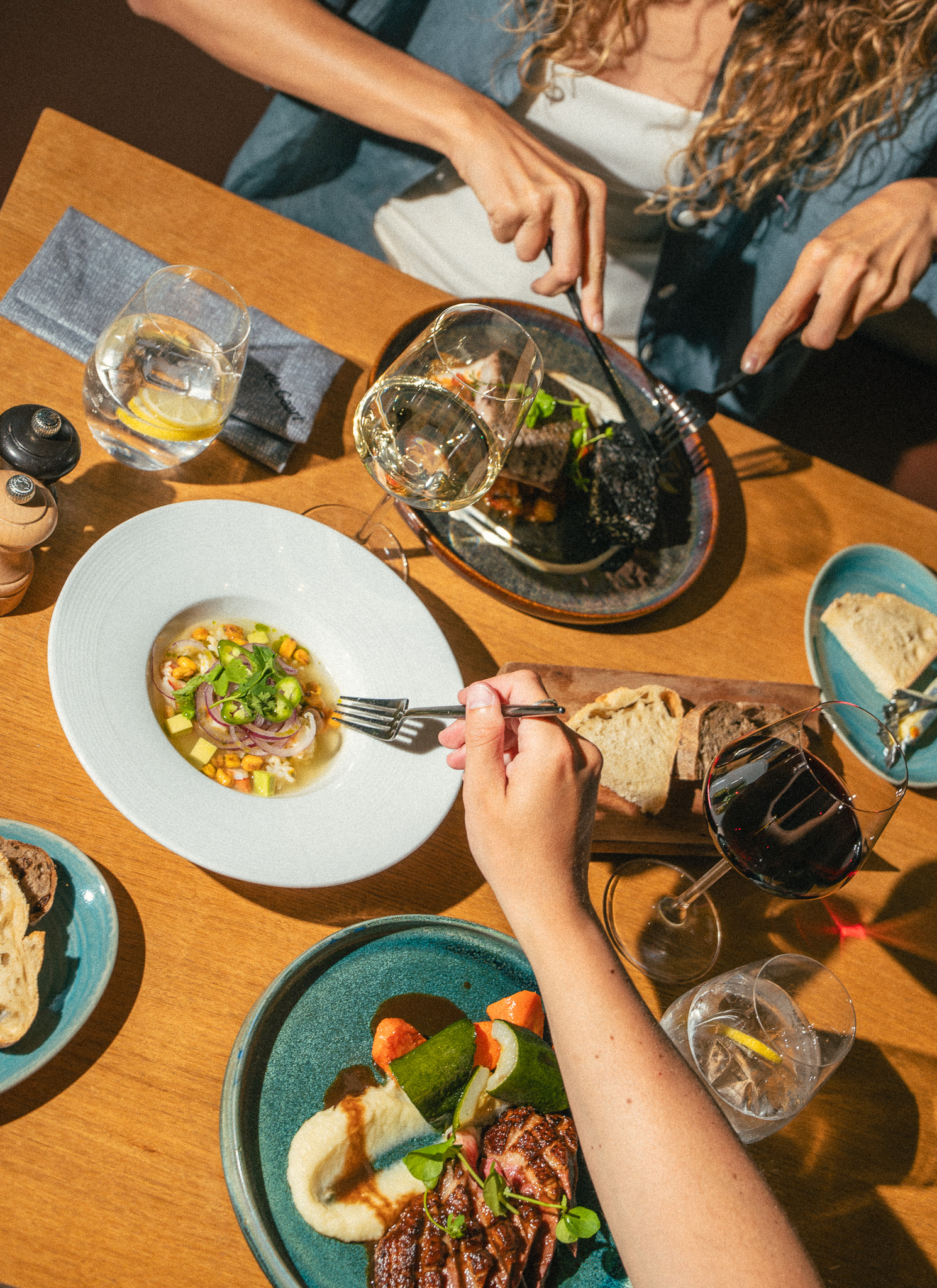 a group of people eating at a table