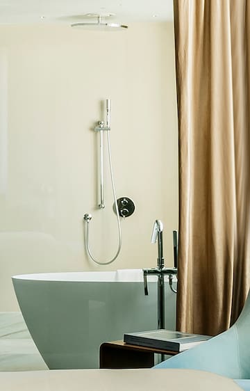 a bathtub and shower curtain