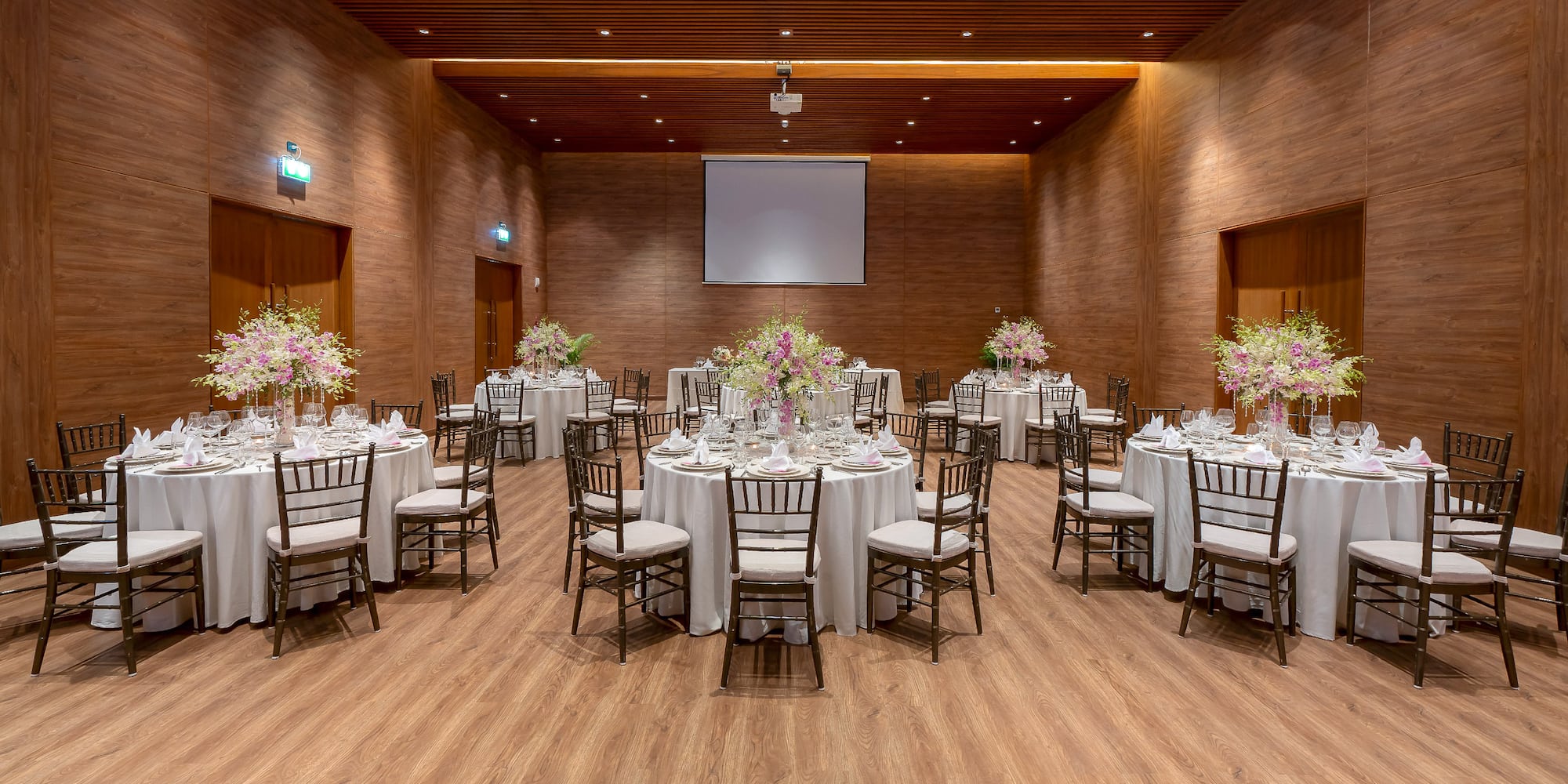 a room with tables and chairs