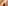 a person stands before a wall of vibrant squares