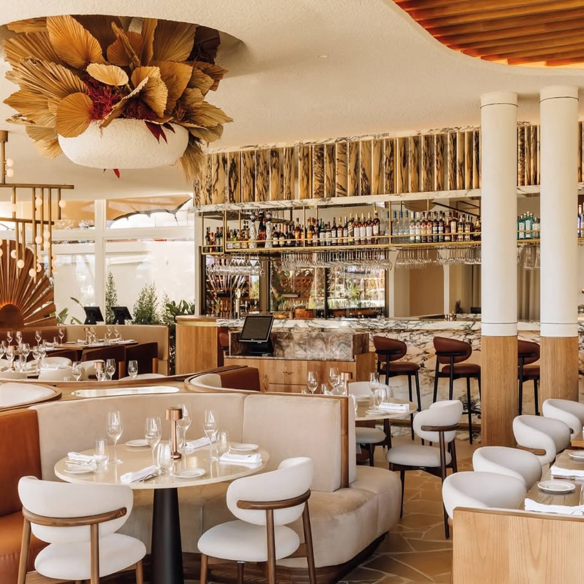 a restaurant with tables and chairs