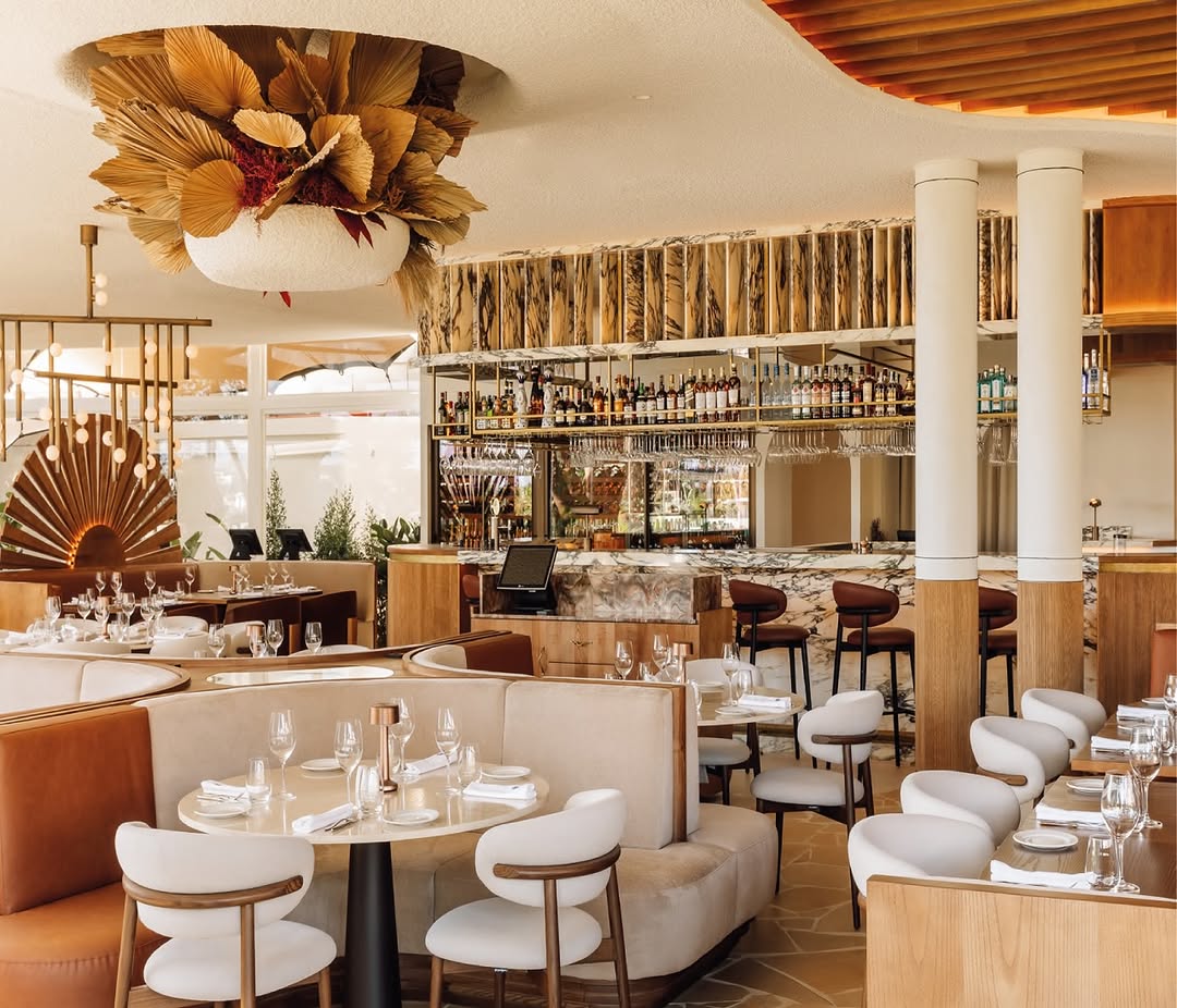 a restaurant with tables and chairs