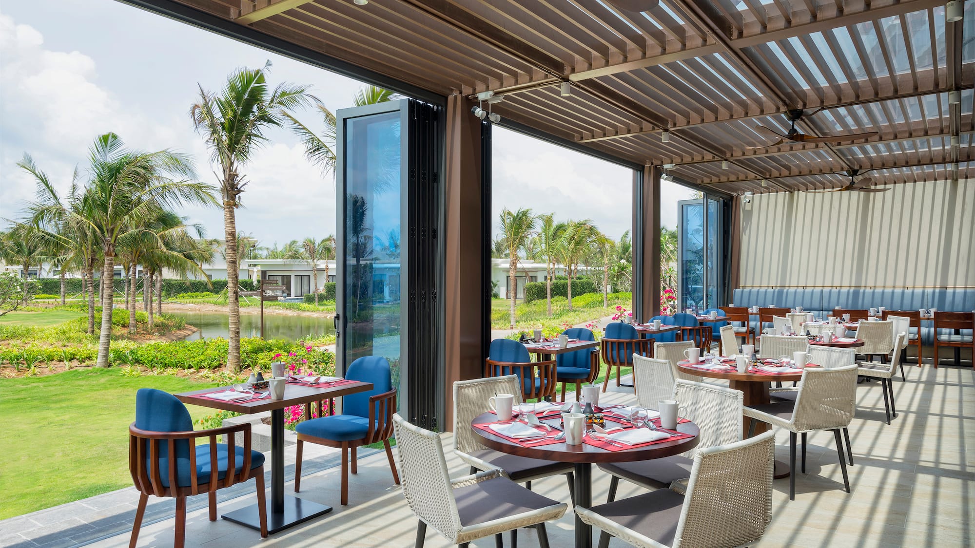 a restaurant with tables and chairs