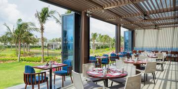 a restaurant with tables and chairs