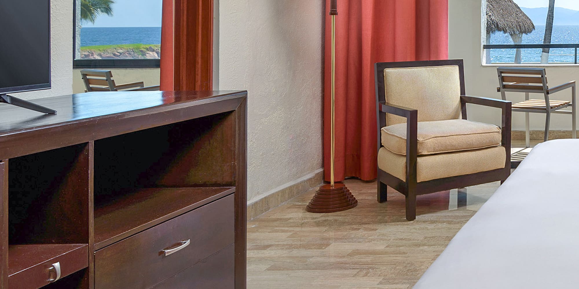 a room with a television and a chair