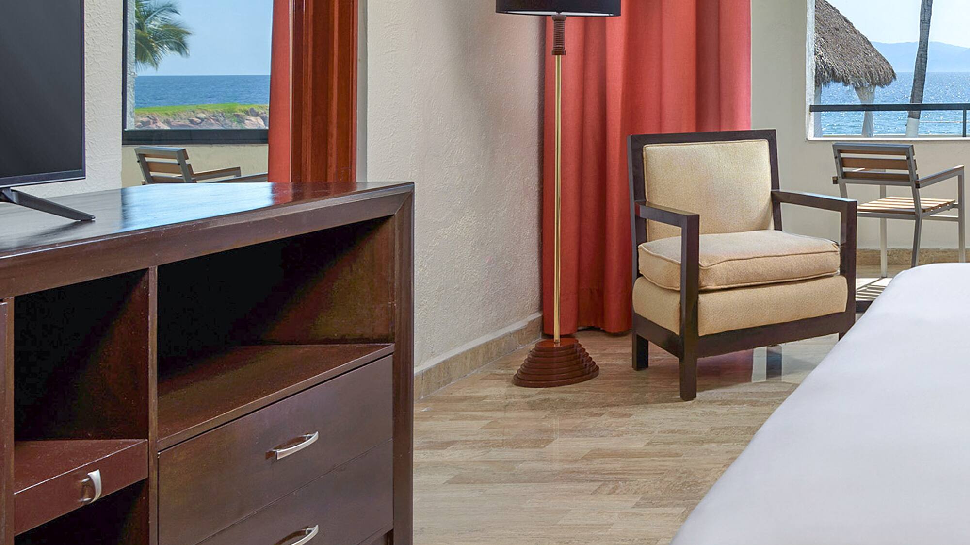 a room with a television and a chair