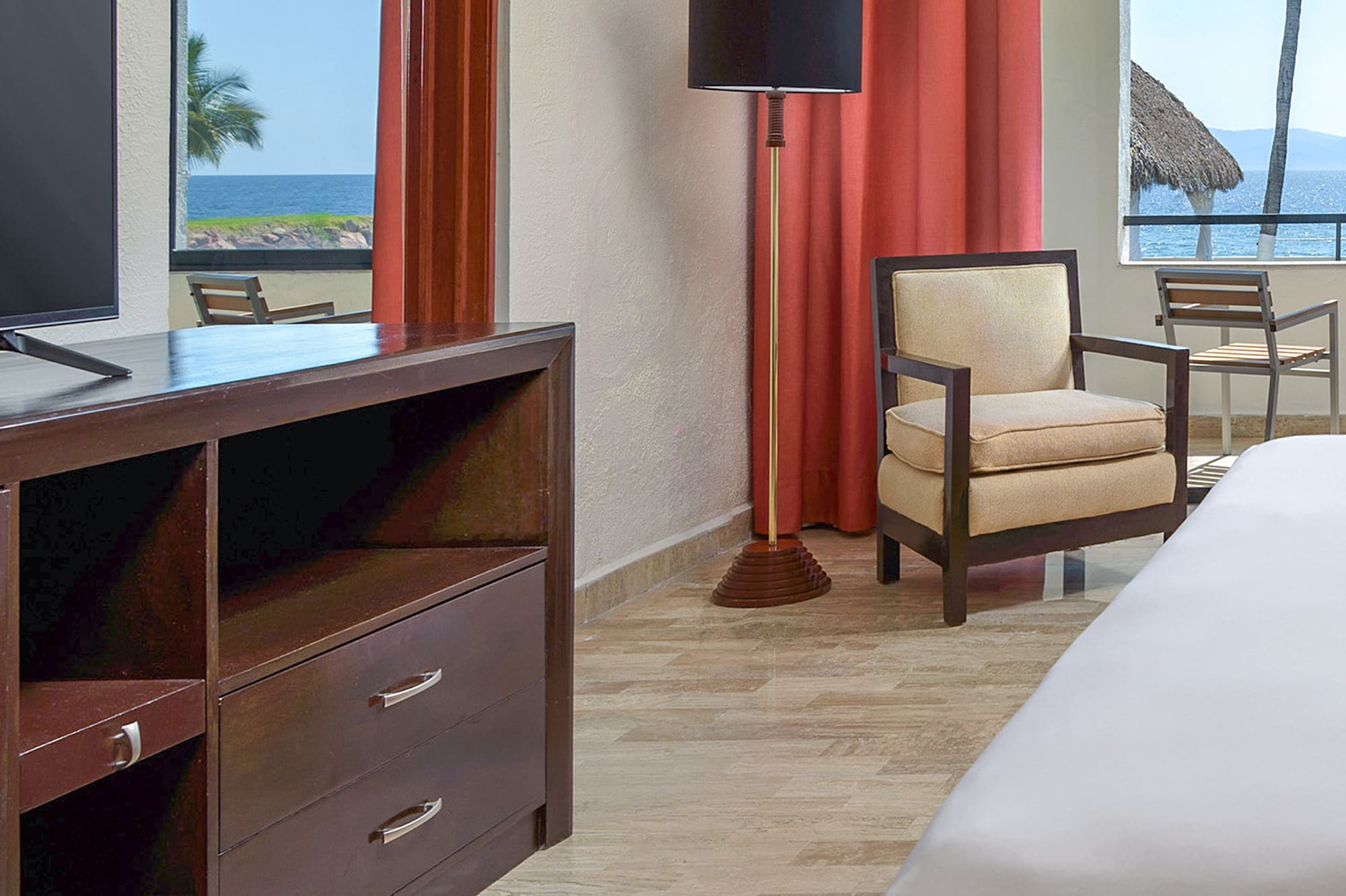 a room with a television and a chair