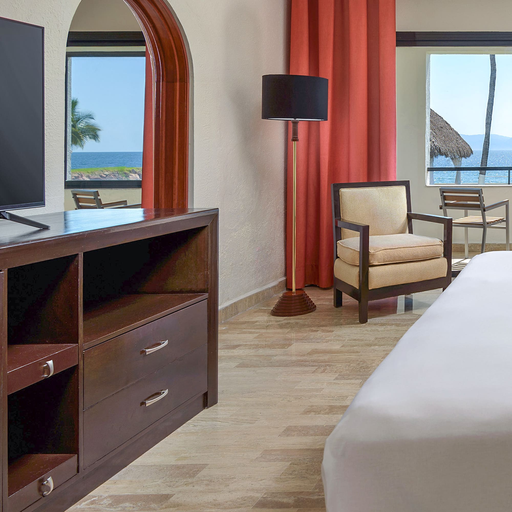 a room with a television and a chair