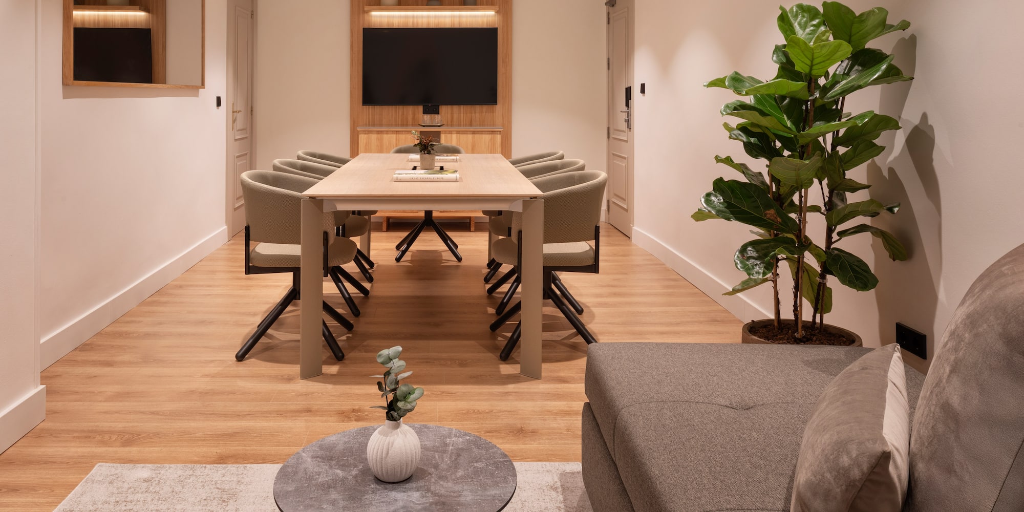 a room with a table and chairs