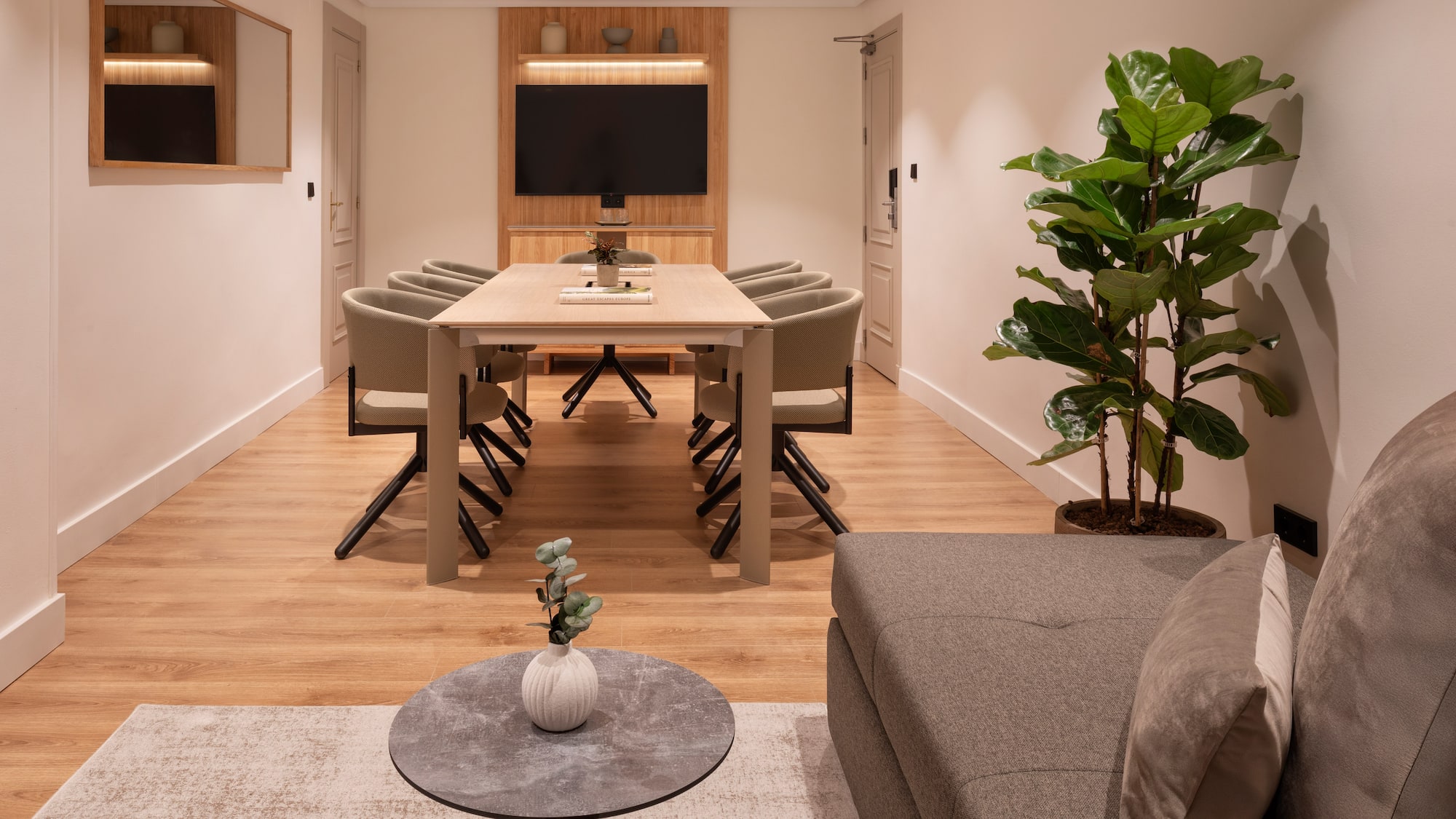 a room with a table and chairs