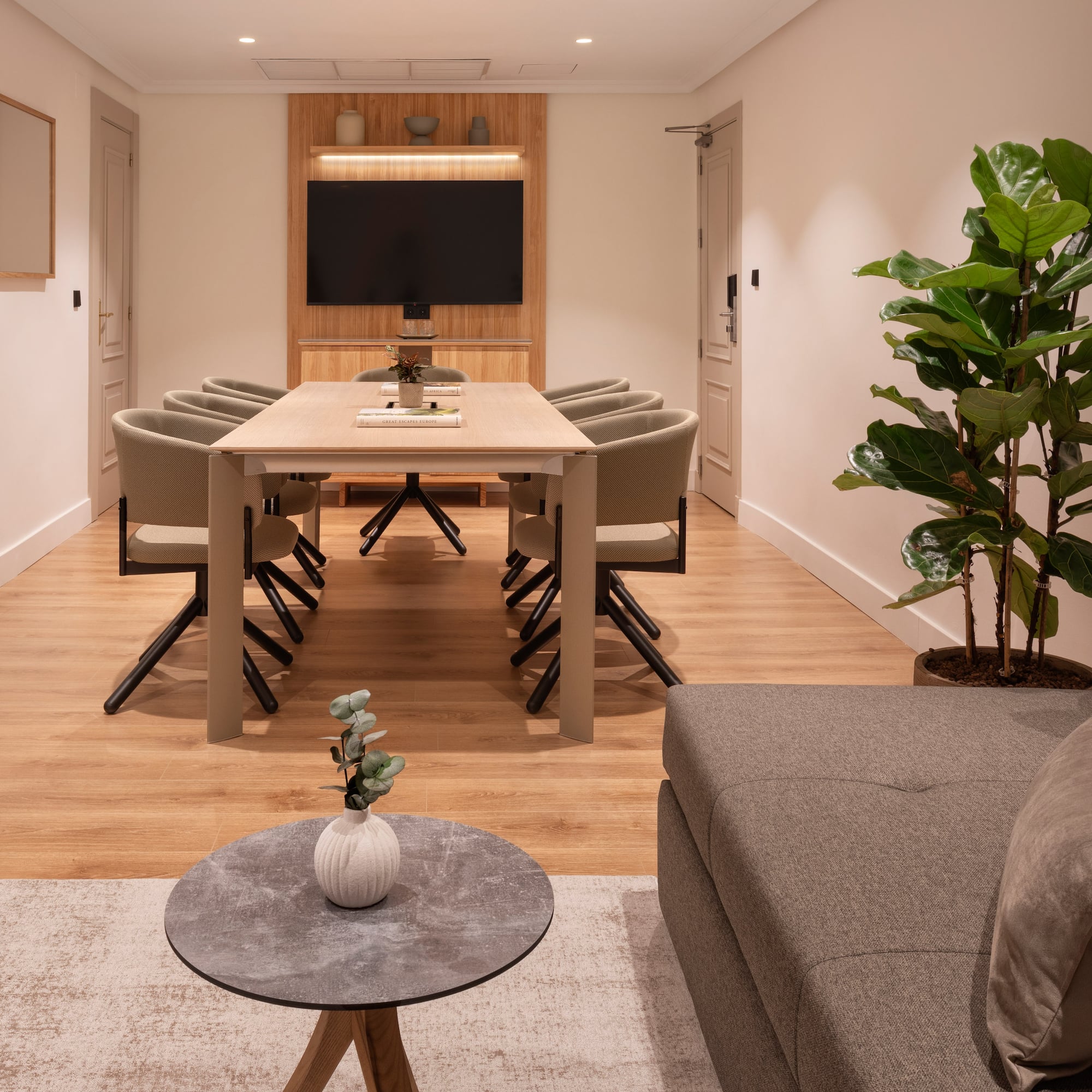 a room with a table and chairs