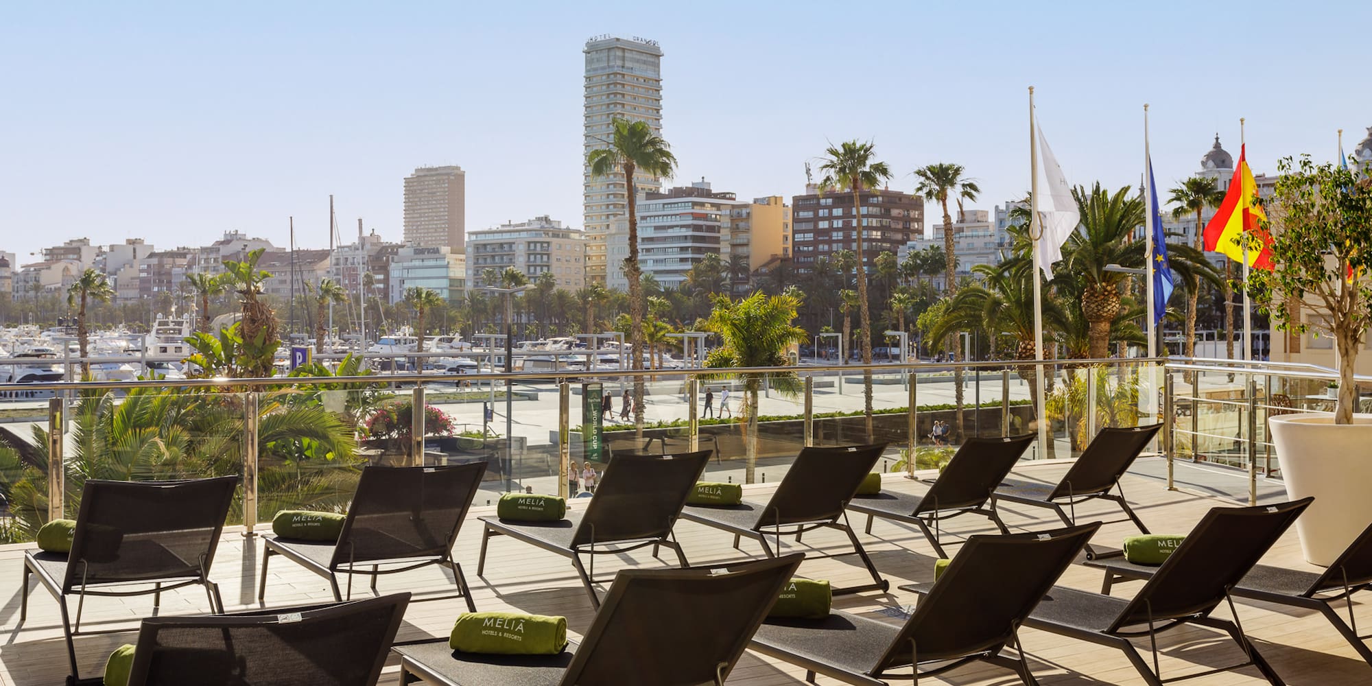a group of lounge chairs on a deck