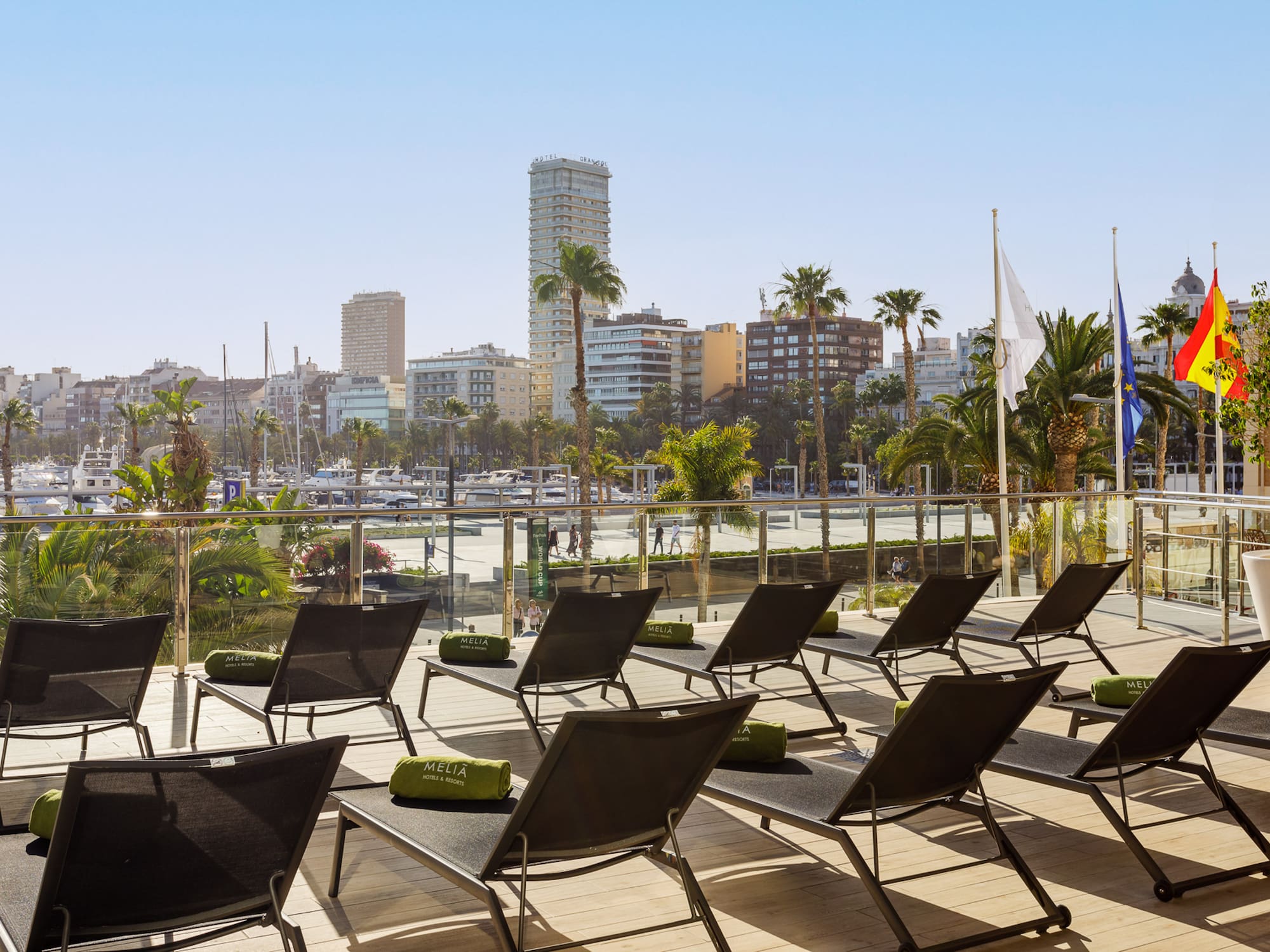 a group of lounge chairs on a deck